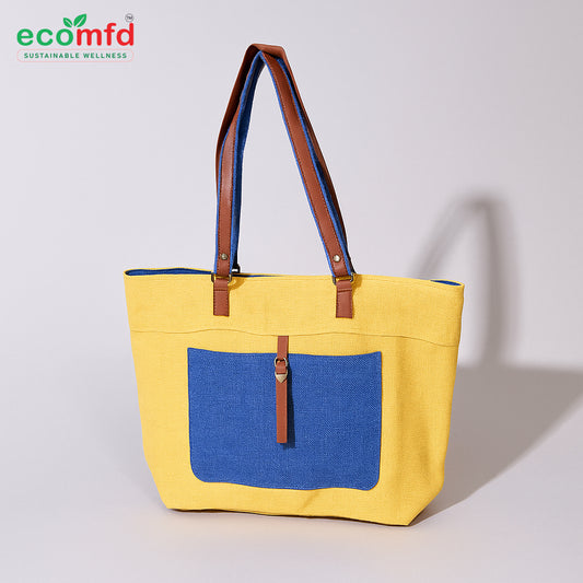 Yellow tote bag with blue pocket and brown straps on a white background, featuring ecomfd branding.